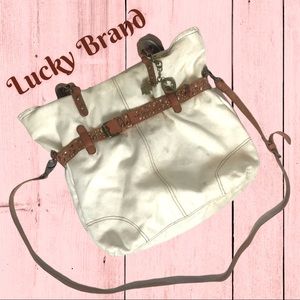 Large Lucky Brand cream canvas bag with cognac colored leather trim